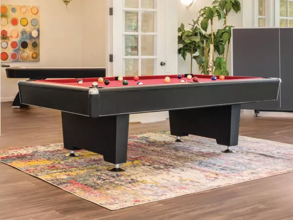 Black Diamond billiards table with red felt and contemporary design.